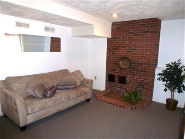 29 Concord Road Bedford, MA 01730 - Photo 16 of 24 a living room with furniture and potted plant