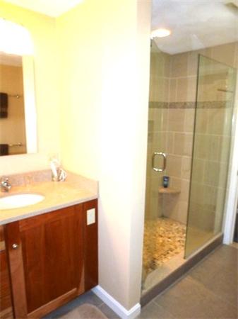 29 Concord Road Bedford, MA 01730 - Photo 21 of 24 a bathroom with a sink and a mirror