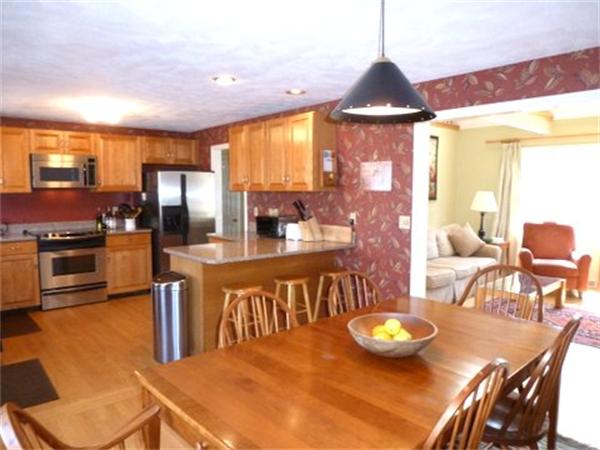 29 Concord Road Bedford, MA 01730 - Photo 7 of 24 a view of a dining room with furniture