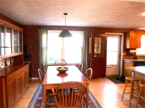 29 Concord Road Bedford, MA 01730 - Photo 9 of 24 a dining room with furniture and window