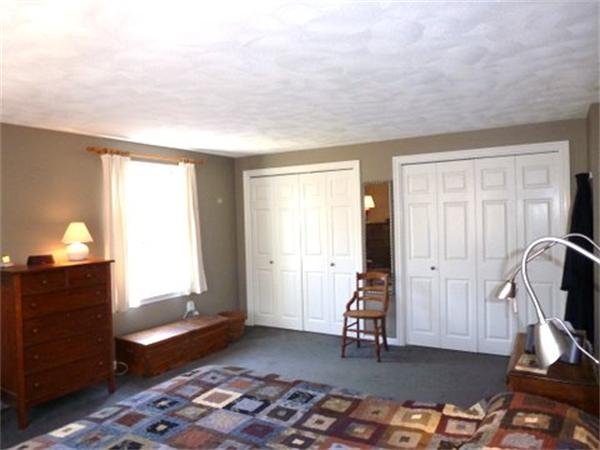 29 Concord Road Bedford, MA 01730 - Photo 10 of 24 a room with furniture and a window