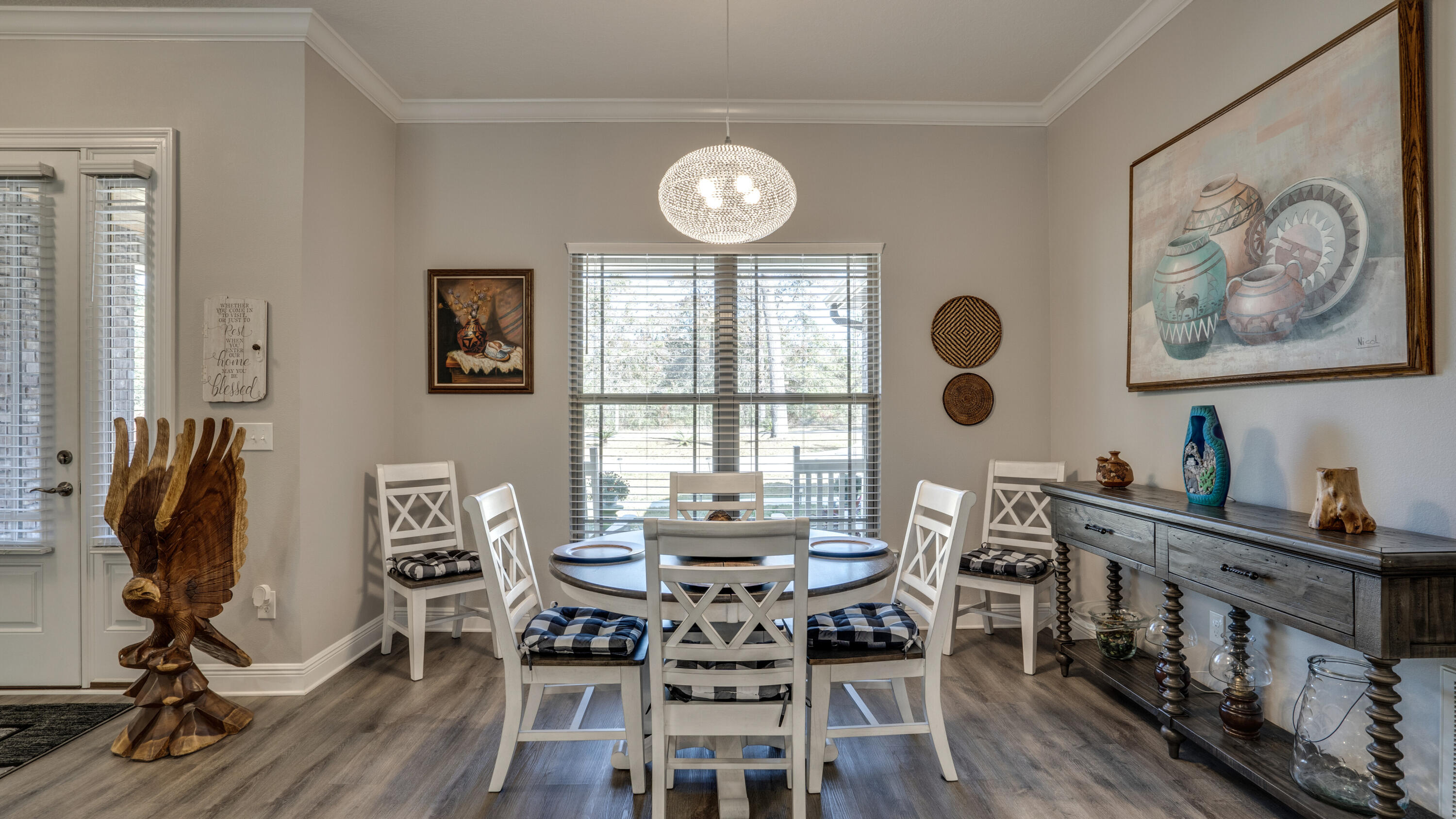 7066 Senterfitt Road Laurel Hill, FL 32567 - Photo 14 of 59 a view of a dining room with furniture and a window