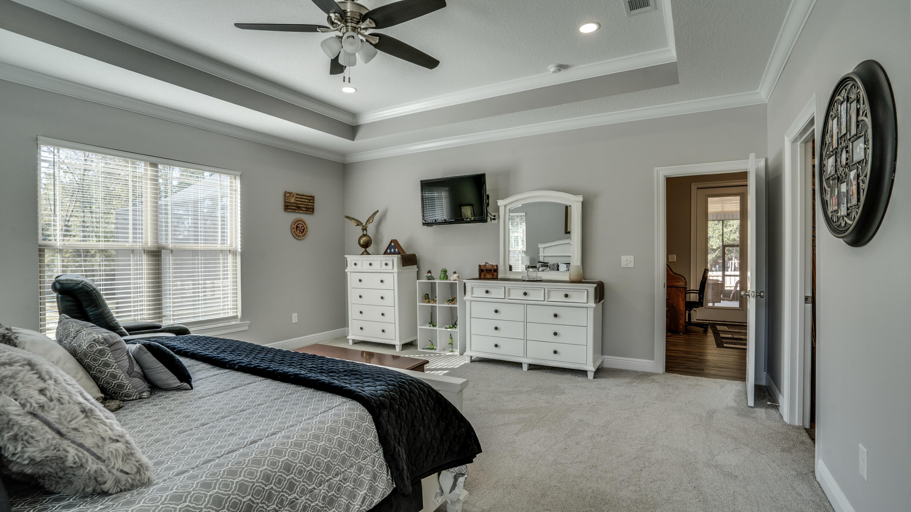 7066 Senterfitt Road Laurel Hill, FL 32567 - Photo 19 of 59 a bedroom with furniture and windows