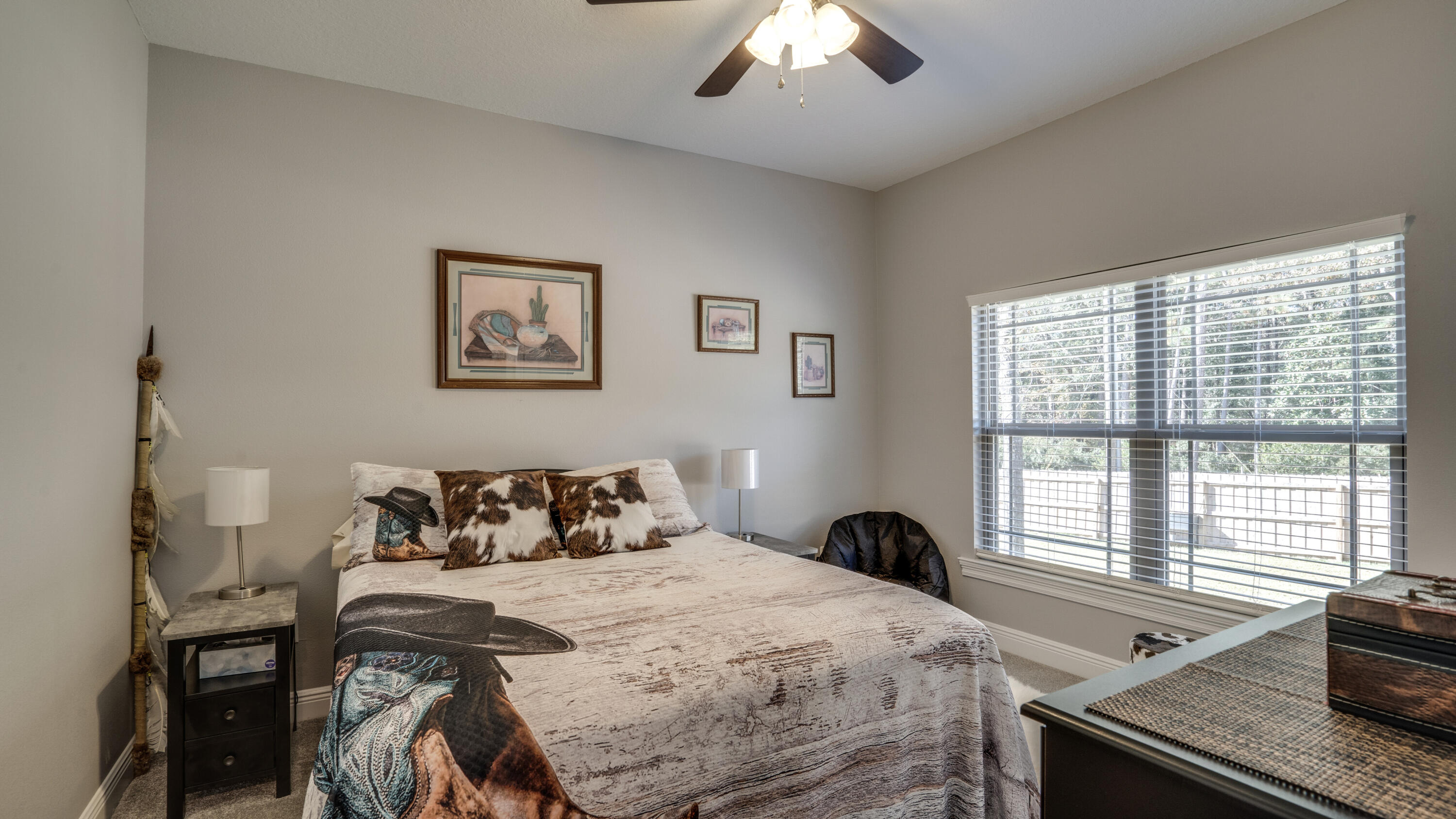 7066 Senterfitt Road Laurel Hill, FL 32567 - Photo 24 of 59 a bedroom with a bed and a window