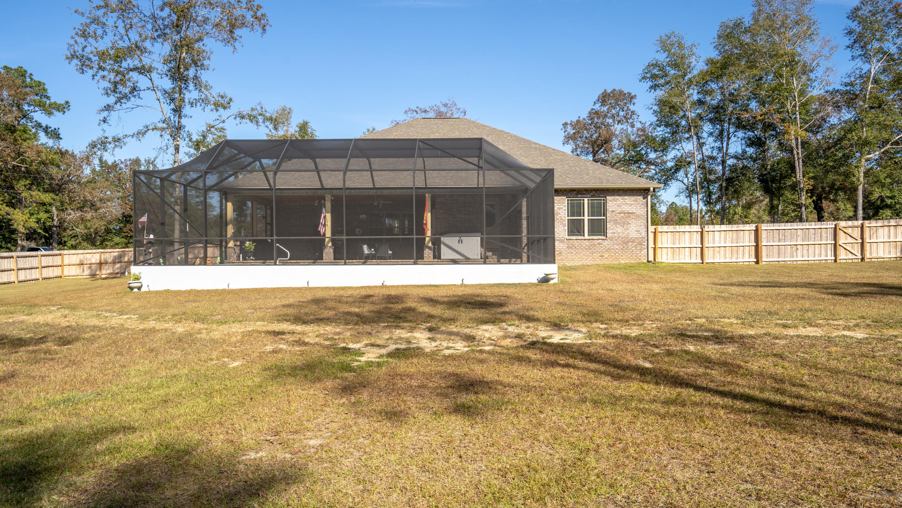 7066 Senterfitt Road Laurel Hill, FL 32567 - Photo 39 of 59 a view of a house with a yard