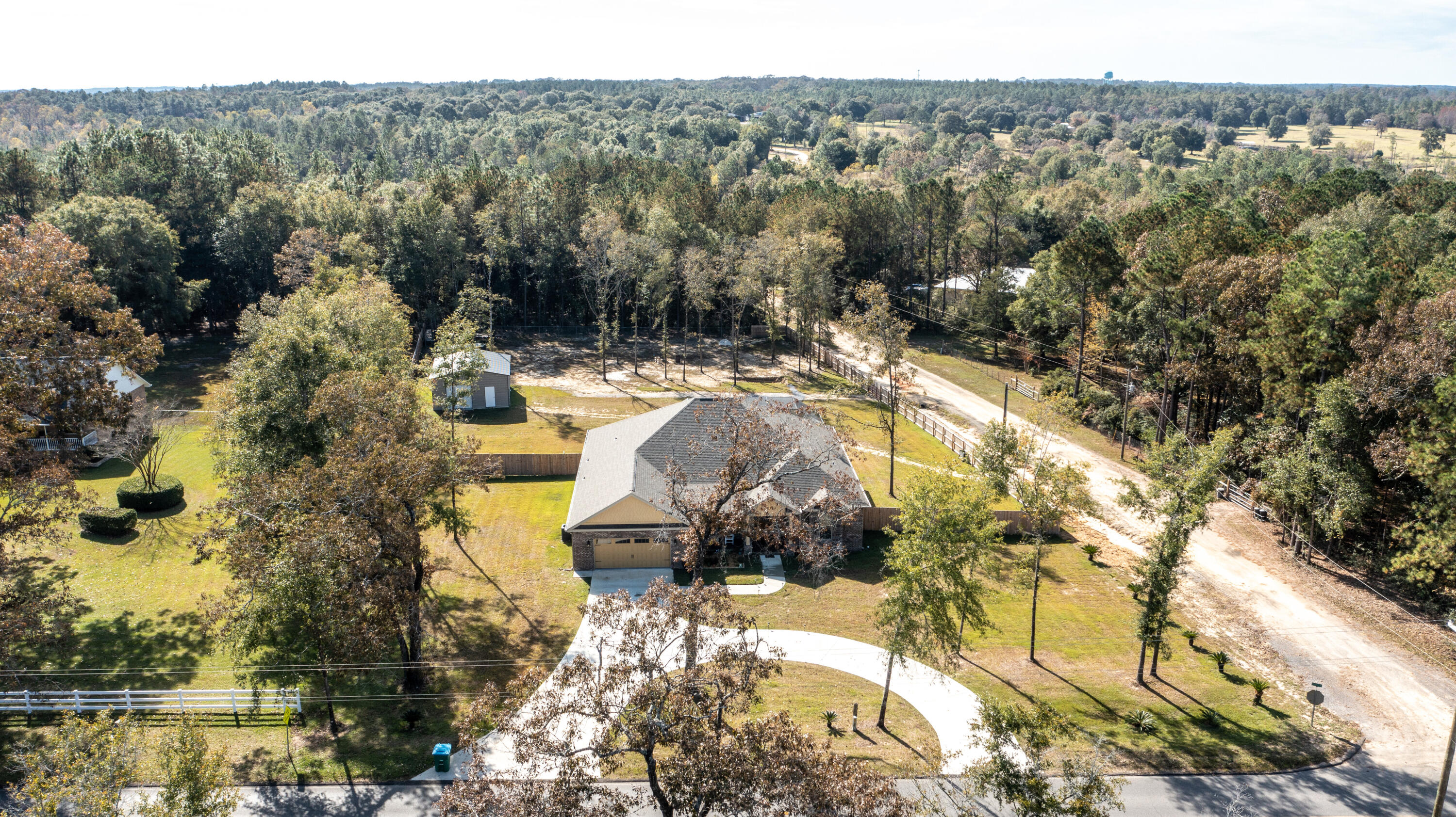 7066 Senterfitt Road Laurel Hill, FL 32567 - Photo 50 of 59 a view of a swimming pool with a yard