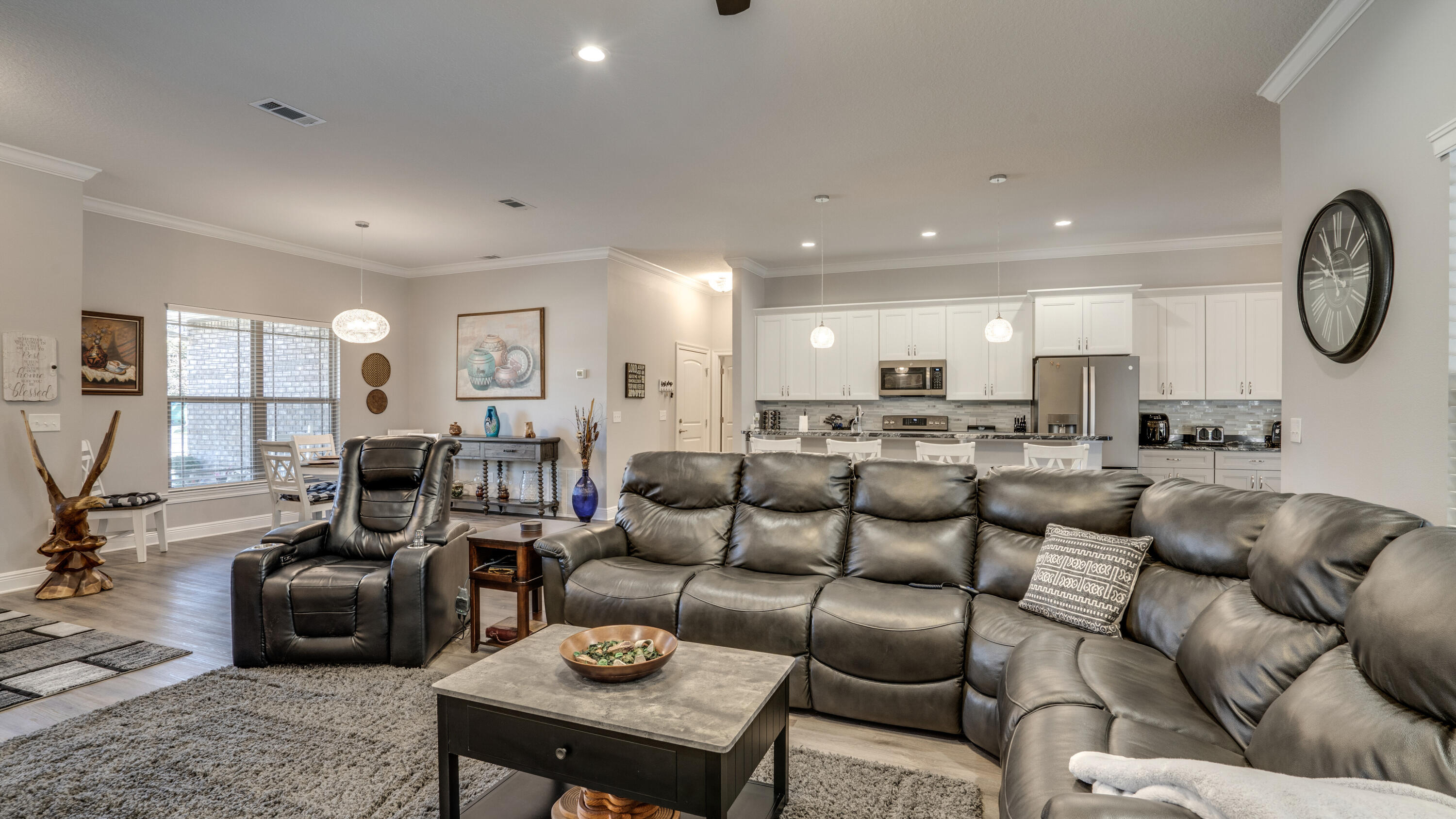 7066 Senterfitt Road Laurel Hill, FL 32567 - Photo 9 of 59 a living room with furniture kitchen view and a table