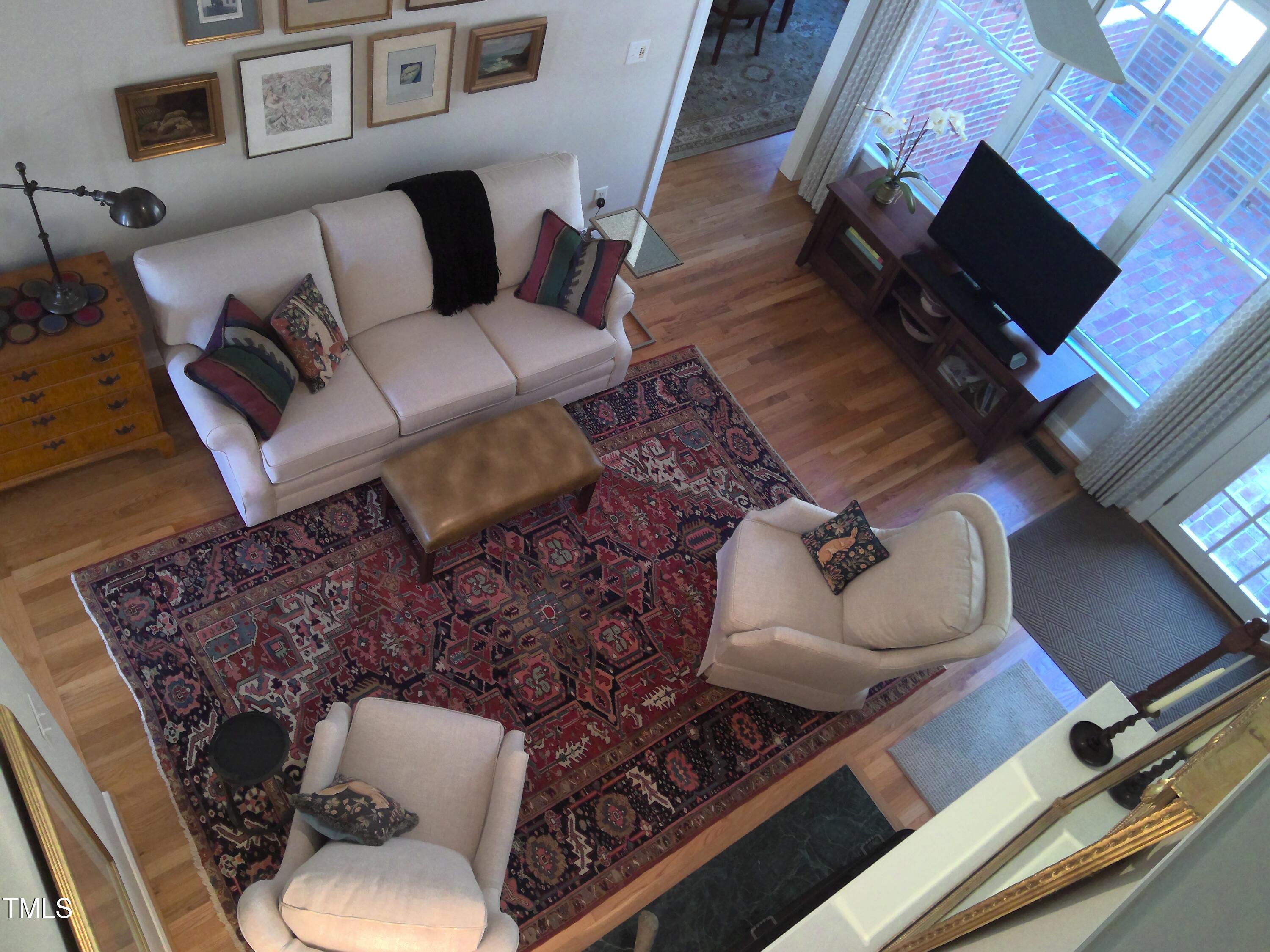 12 Crail Court Durham, NC 27712 - Photo 6 of 29 a living room with furniture and a flat screen tv