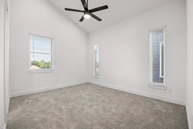 a spacious bathroom with a bathtub and a shower