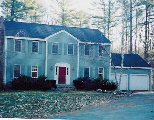 145 B Spofford Road Boxford, MA 01921 - Photo 1 of 1 a front view of a house with a garden