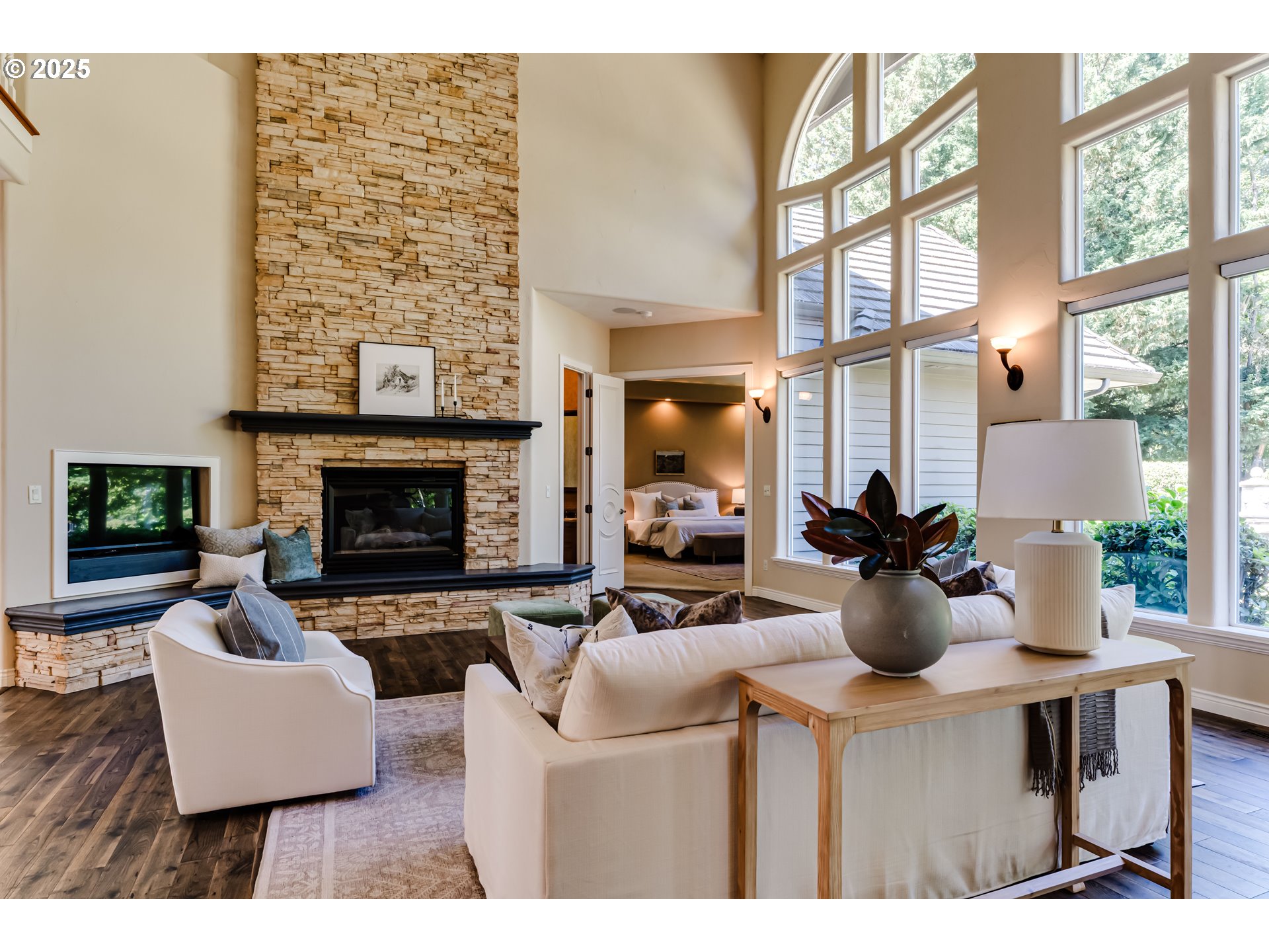 2874 Riverwalk Loop Eugene, OR 97401 - Photo 11 of 48 a living room with furniture a fireplace and potted plants