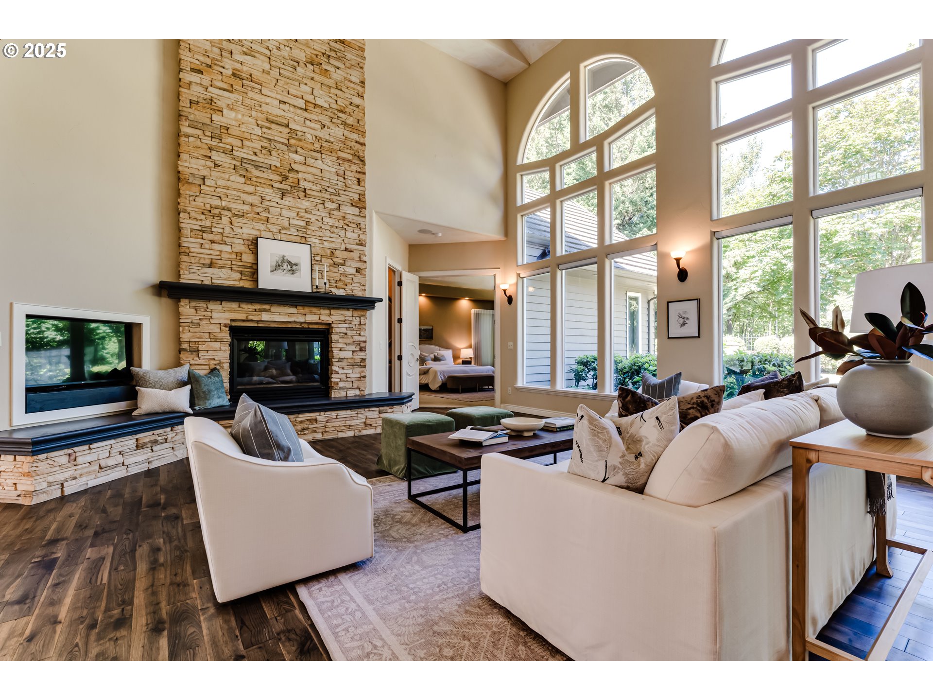 2874 Riverwalk Loop Eugene, OR 97401 - Photo 15 of 48 a living room with furniture a fireplace and a large window