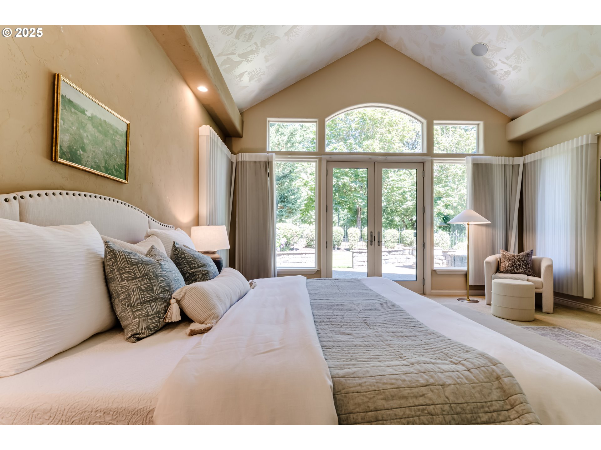 2874 Riverwalk Loop Eugene, OR 97401 - Photo 25 of 48 a bedroom with a large bed and a large window