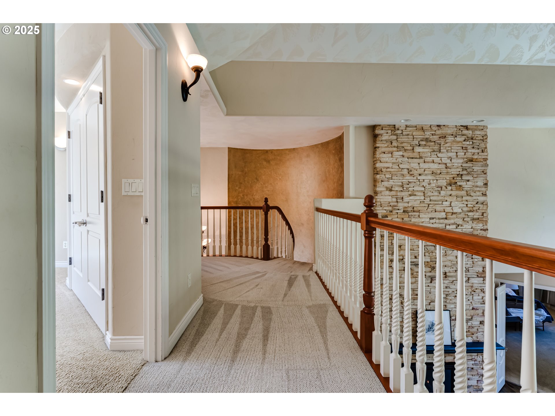 2874 Riverwalk Loop Eugene, OR 97401 - Photo 31 of 48 a view of a hallway with wooden floor and staircase