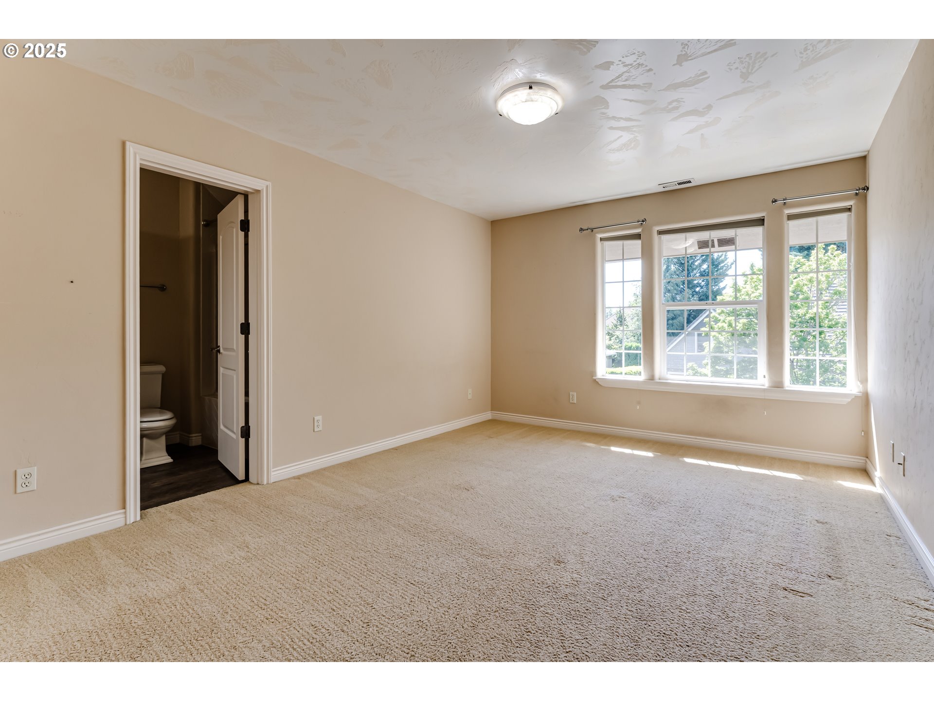 2874 Riverwalk Loop Eugene, OR 97401 - Photo 37 of 48 a view of an empty room with a window