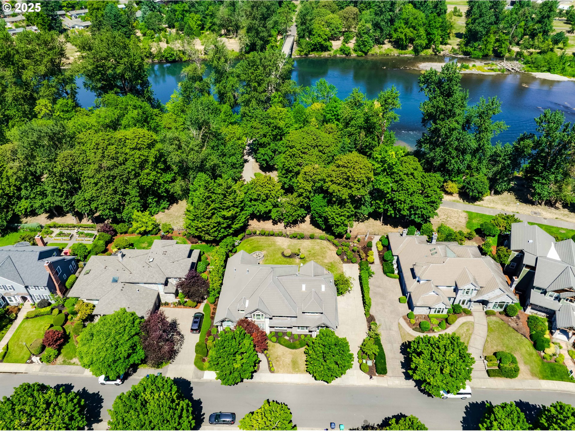 2874 Riverwalk Loop Eugene, OR 97401 - Photo 47 of 48 an aerial view of residential house with outdoor space and lake view