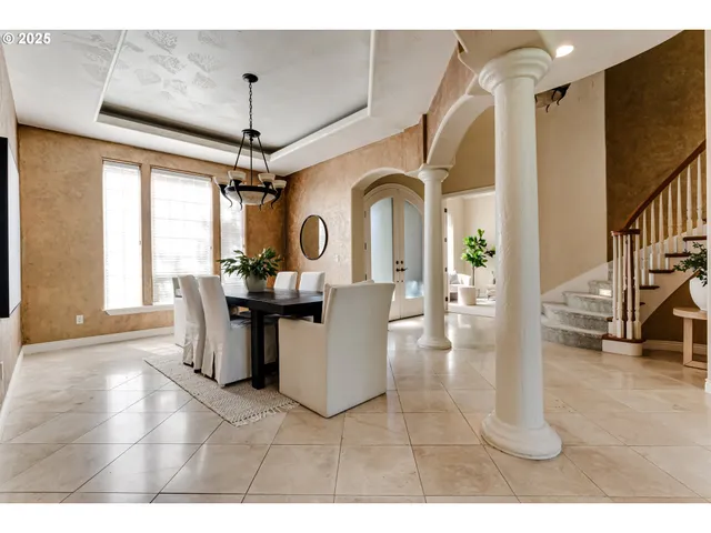 a view of a dining room with furniture window and outside view