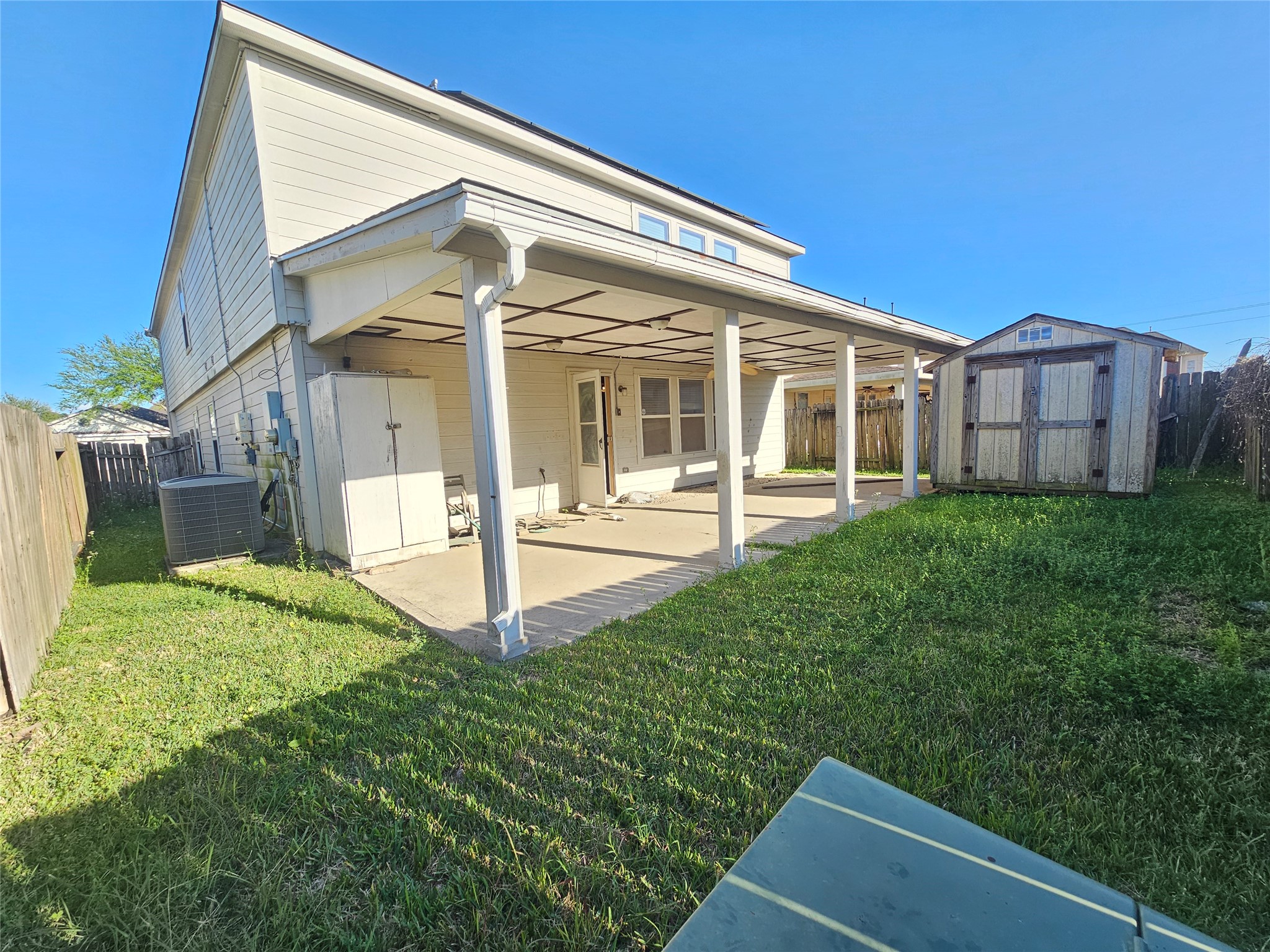 11015 Walkup Way Houston, TX 77044 - Photo 25 of 26 Covered porch with fan