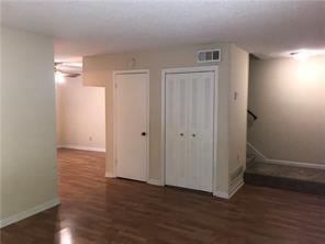 394 Promenade Court Marietta, GA 30064 - Photo 4 of 14 a view of an empty room with wooden floor