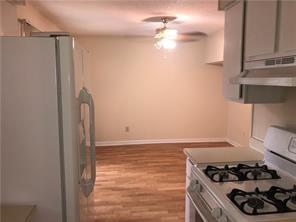 394 Promenade Court Marietta, GA 30064 - Photo 10 of 14 a kitchen with a refrigerator stove and a sink