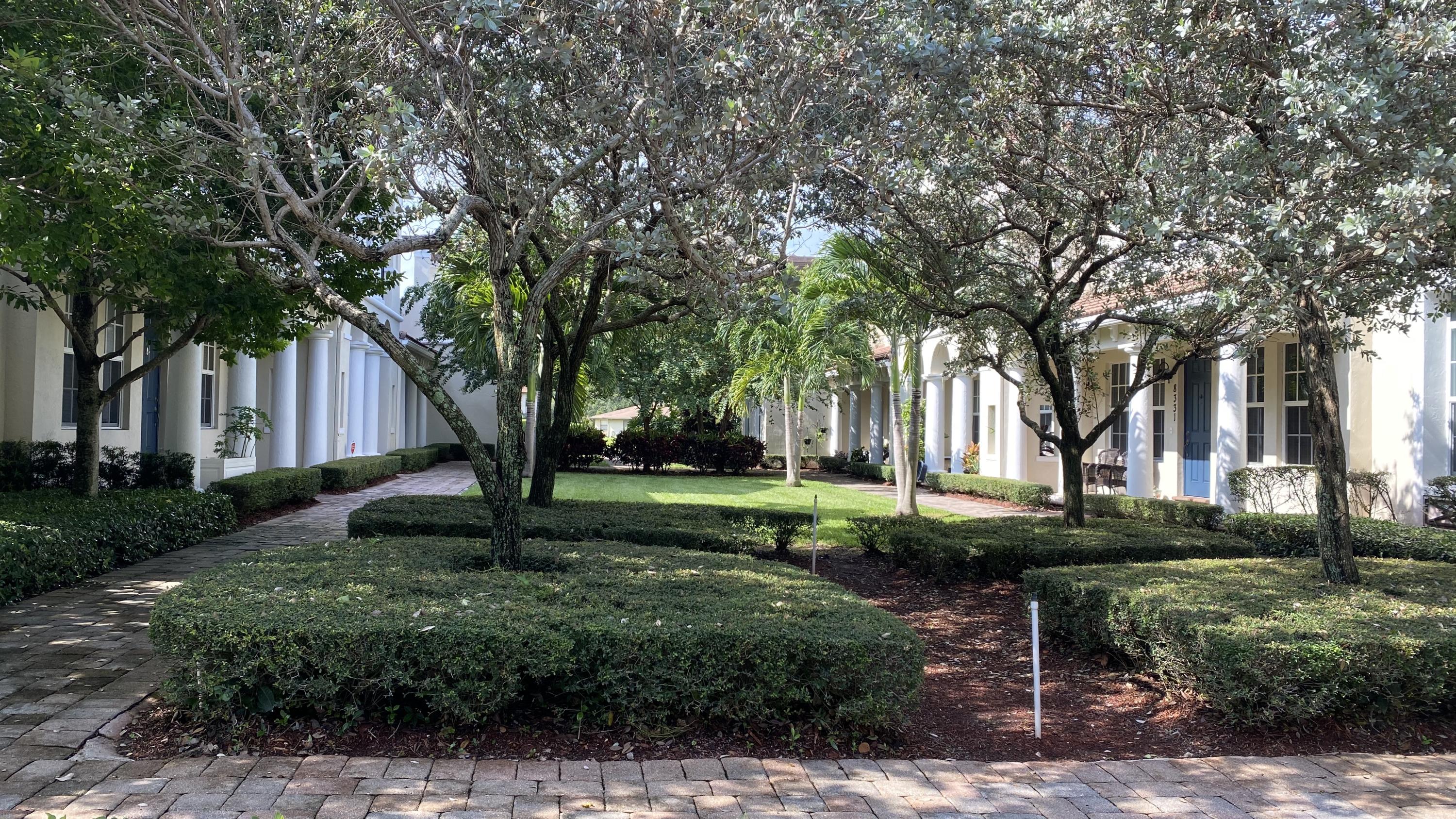 8340 Northwest 7th Court Boca Raton, FL 33487 - Photo 26 of 36 garden to the door