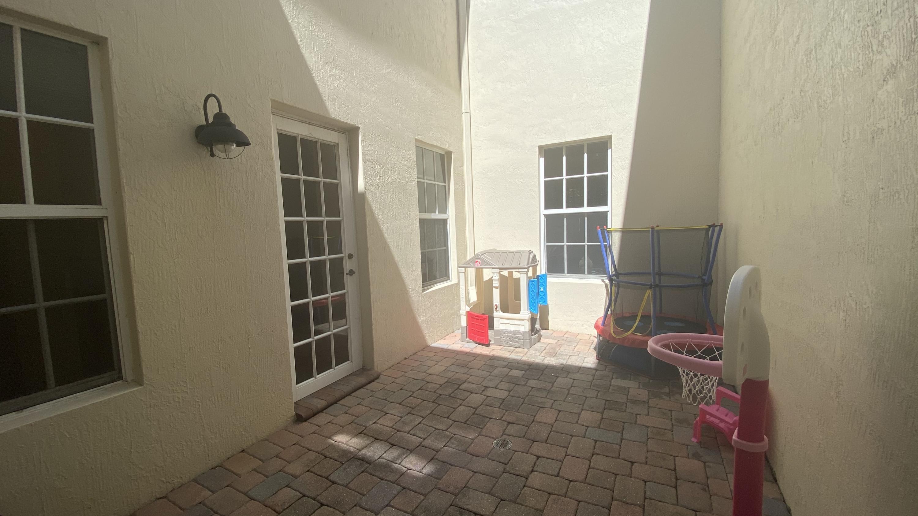 8340 Northwest 7th Court Boca Raton, FL 33487 - Photo 32 of 36 private courtyard