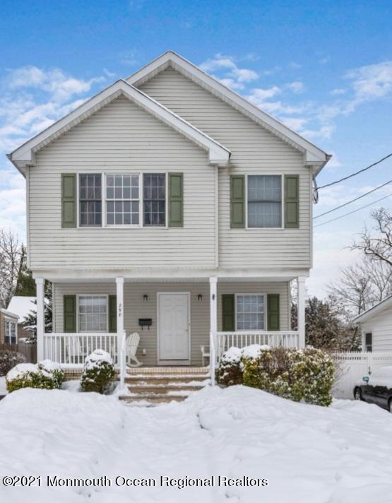298 Spring Street Red Bank, NJ 07701 - Photo 2 of 17 a front view of a house with a yard