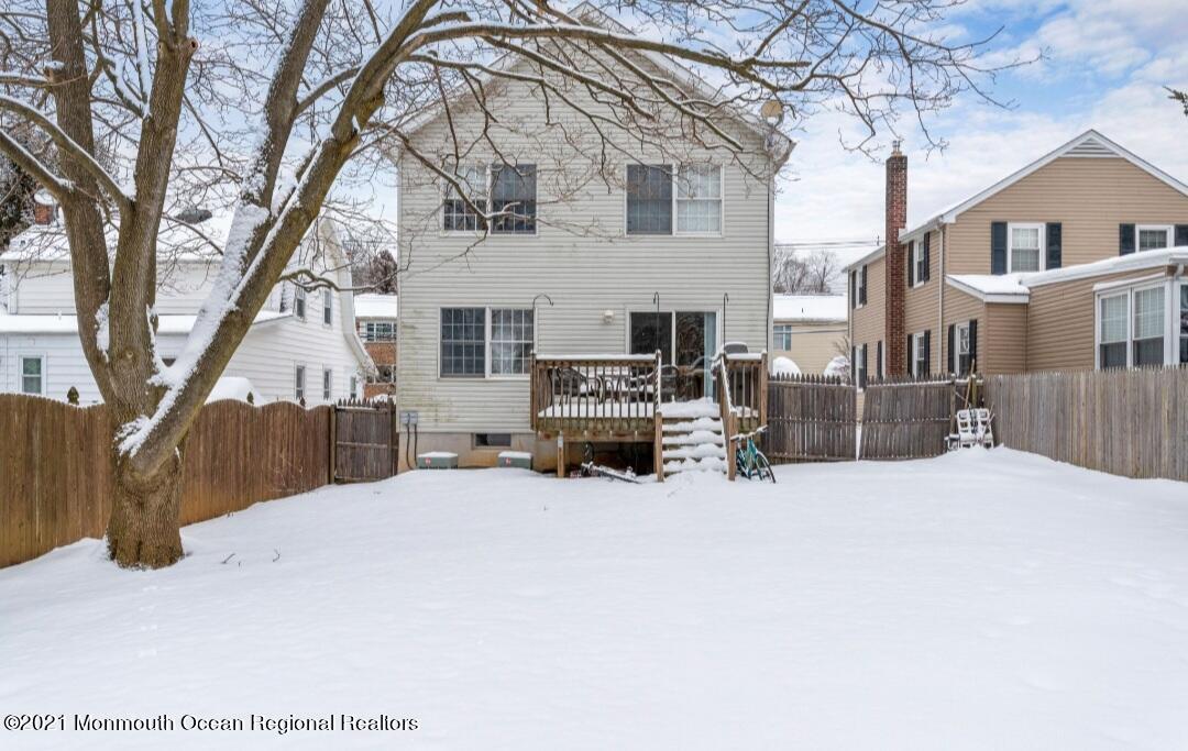 298 Spring Street Red Bank, NJ 07701 - Photo 5 of 17 a view of a house with snow in front of house
