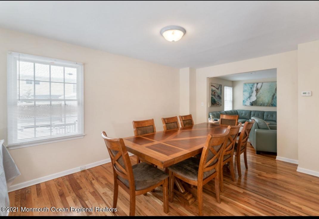 298 Spring Street Red Bank, NJ 07701 - Photo 9 of 17 a view of a dining room with furniture and wooden floor