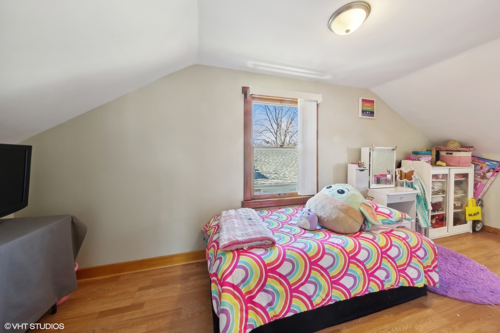 8715 44th Place Lyons, IL 60534 - Photo 12 of 28 a bedroom with a bed and wooden floor