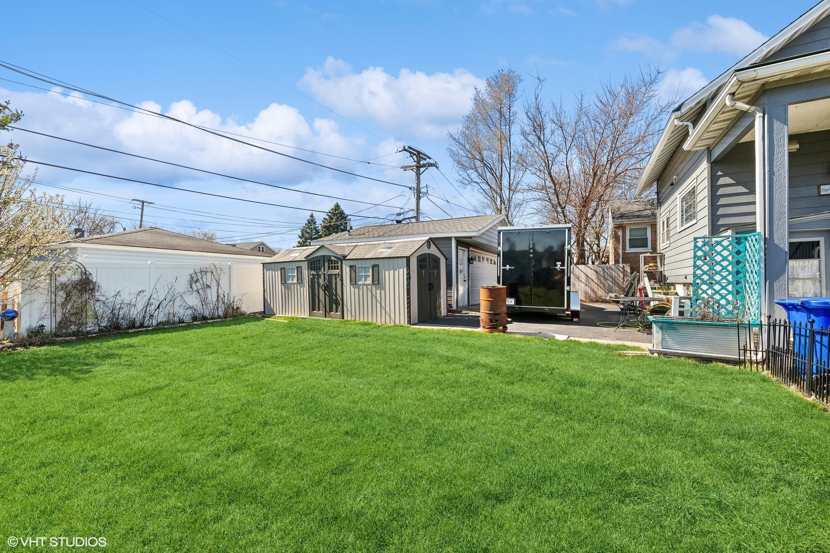 8715 44th Place Lyons, IL 60534 - Photo 25 of 28 a view of a yard with furniture and a table