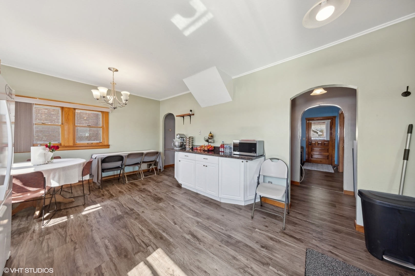 8715 44th Place Lyons, IL 60534 - Photo 7 of 28 a living room with furniture and view of kitchen