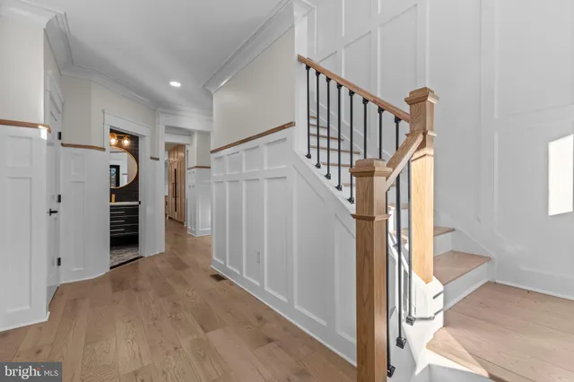 a view of entryway with stairs and furniture