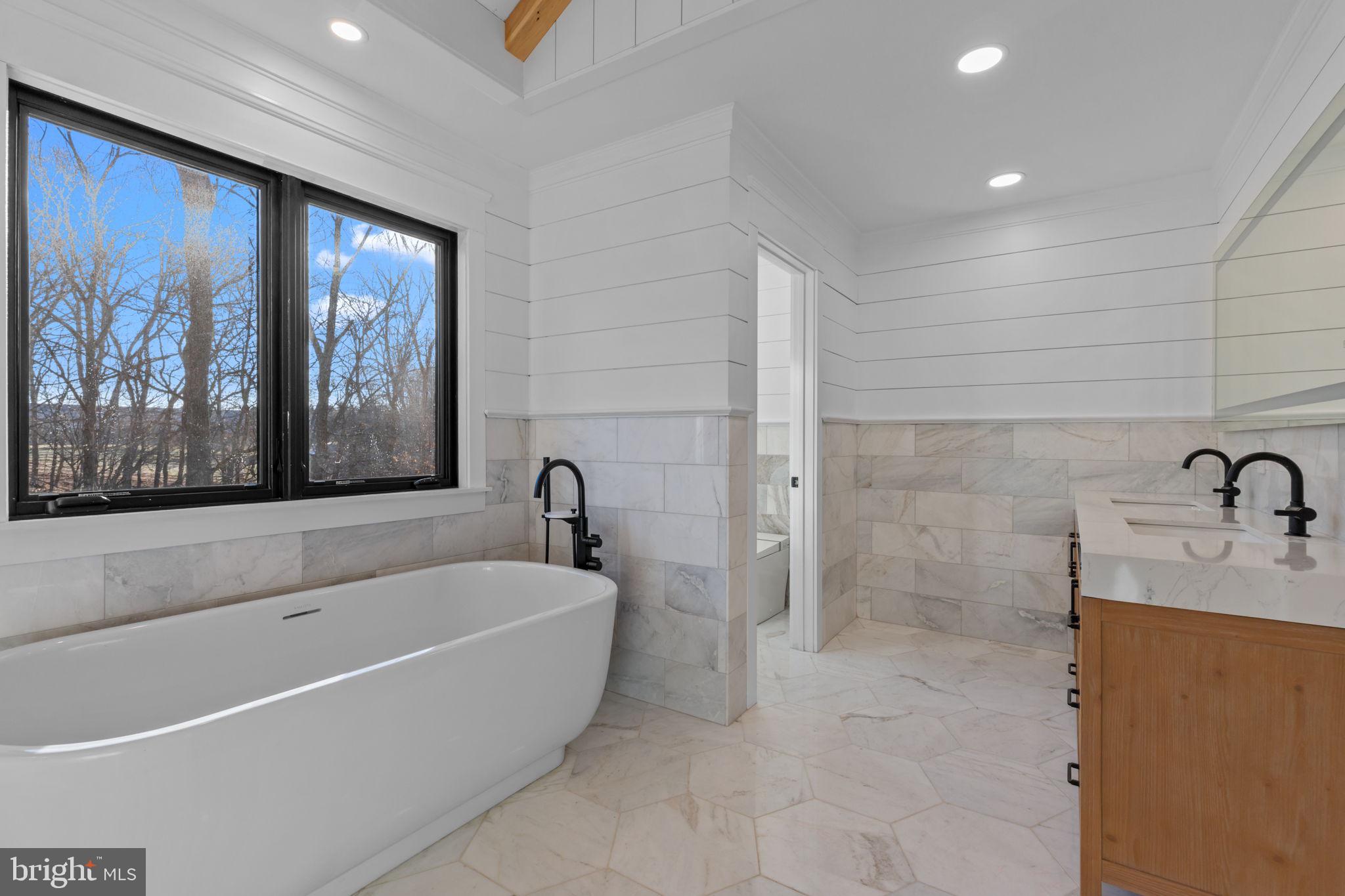 348 Pineville Road Newtown, PA 18940 - Photo 18 of 43 Primary bath & toilet cover a full 200 sq ft