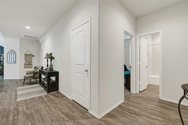 a view of a livingroom with wooden floor