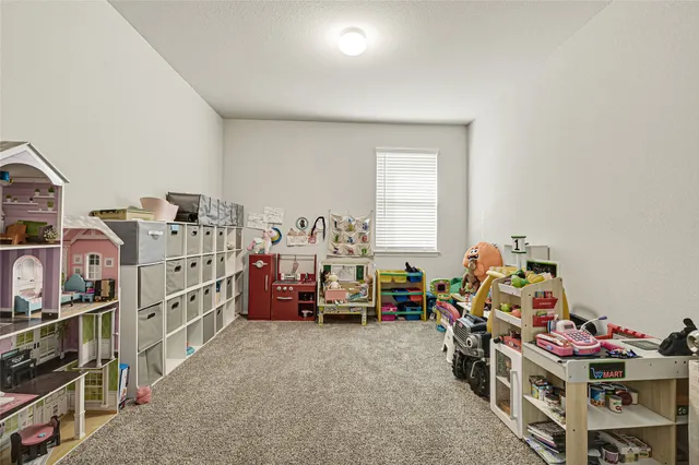 a view of a room with baby toys