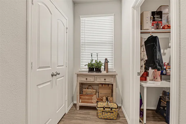 a bedroom with a bed and a closet