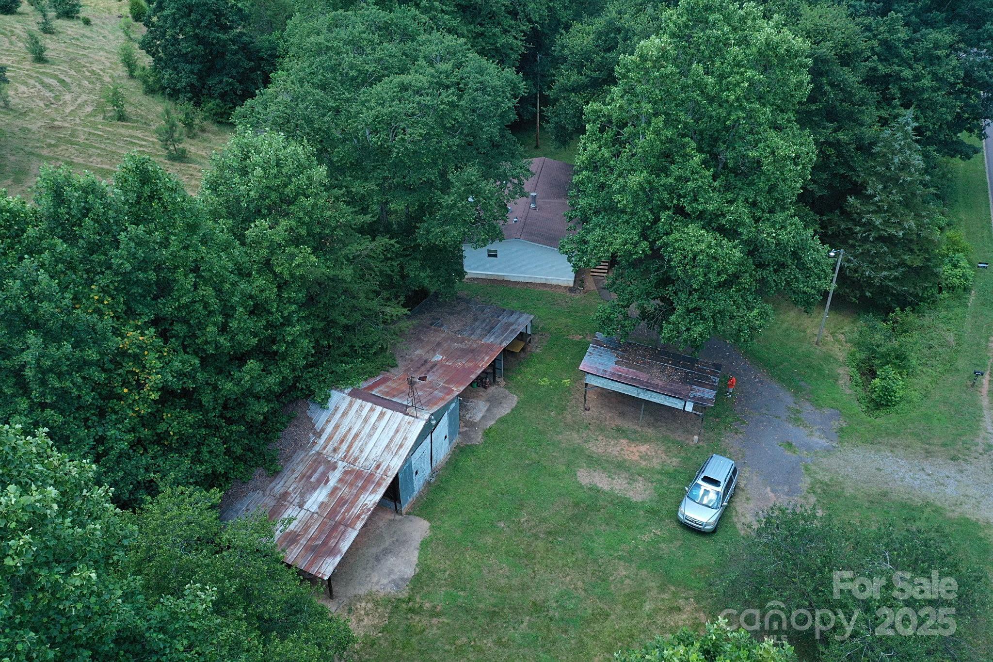 4171 Leatherman Road Vale, NC 28168 - Photo 11 of 24 an aerial view of a house with backyard space and garden