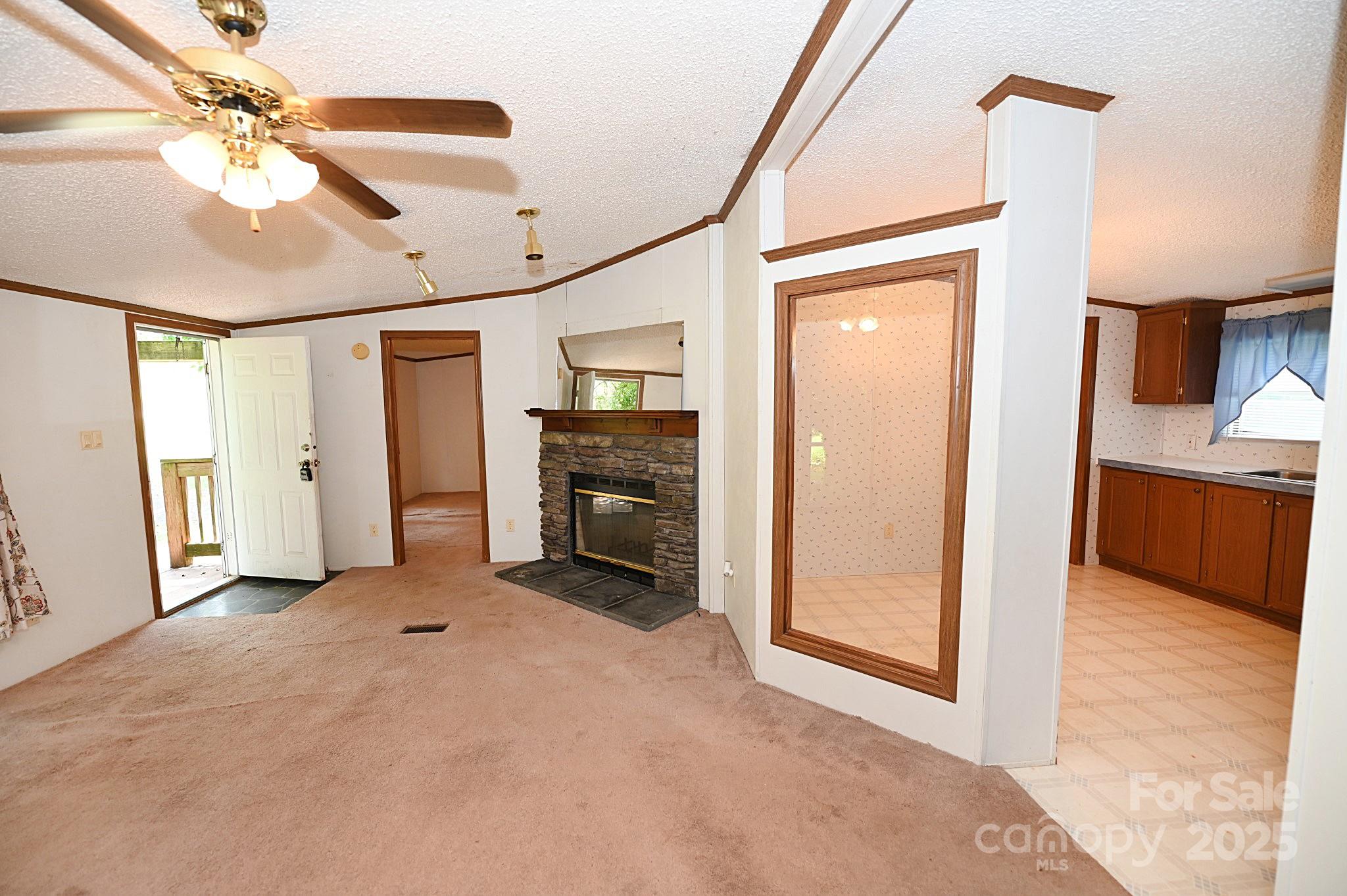 4171 Leatherman Road Vale, NC 28168 - Photo 16 of 24 a view of a livingroom with a staircase