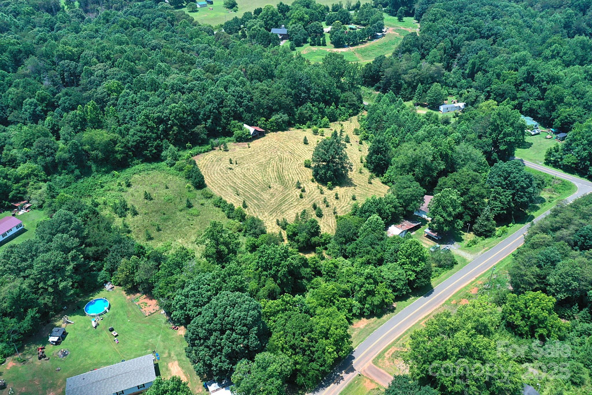 4171 Leatherman Road Vale, NC 28168 - Photo 4 of 24 an aerial view of a house with a yard