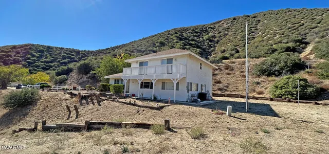 a view of a road with a building in the background
