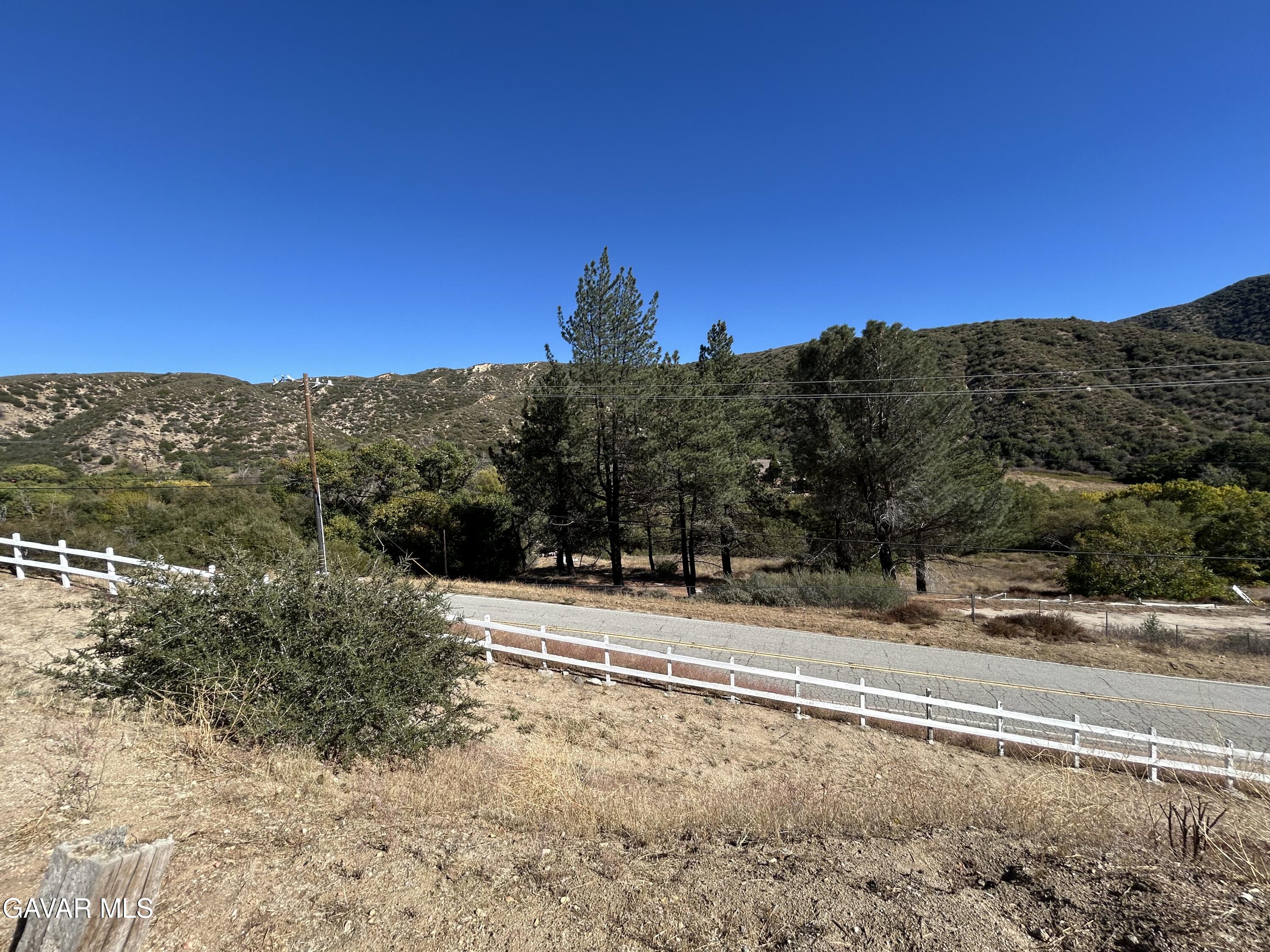 43155 Lake Hughes Road Lake Hughes, CA 93532 - Photo 34 of 37 a view of a road with a building in the background