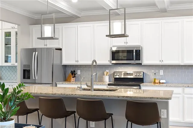 a view of living room with furniture and window