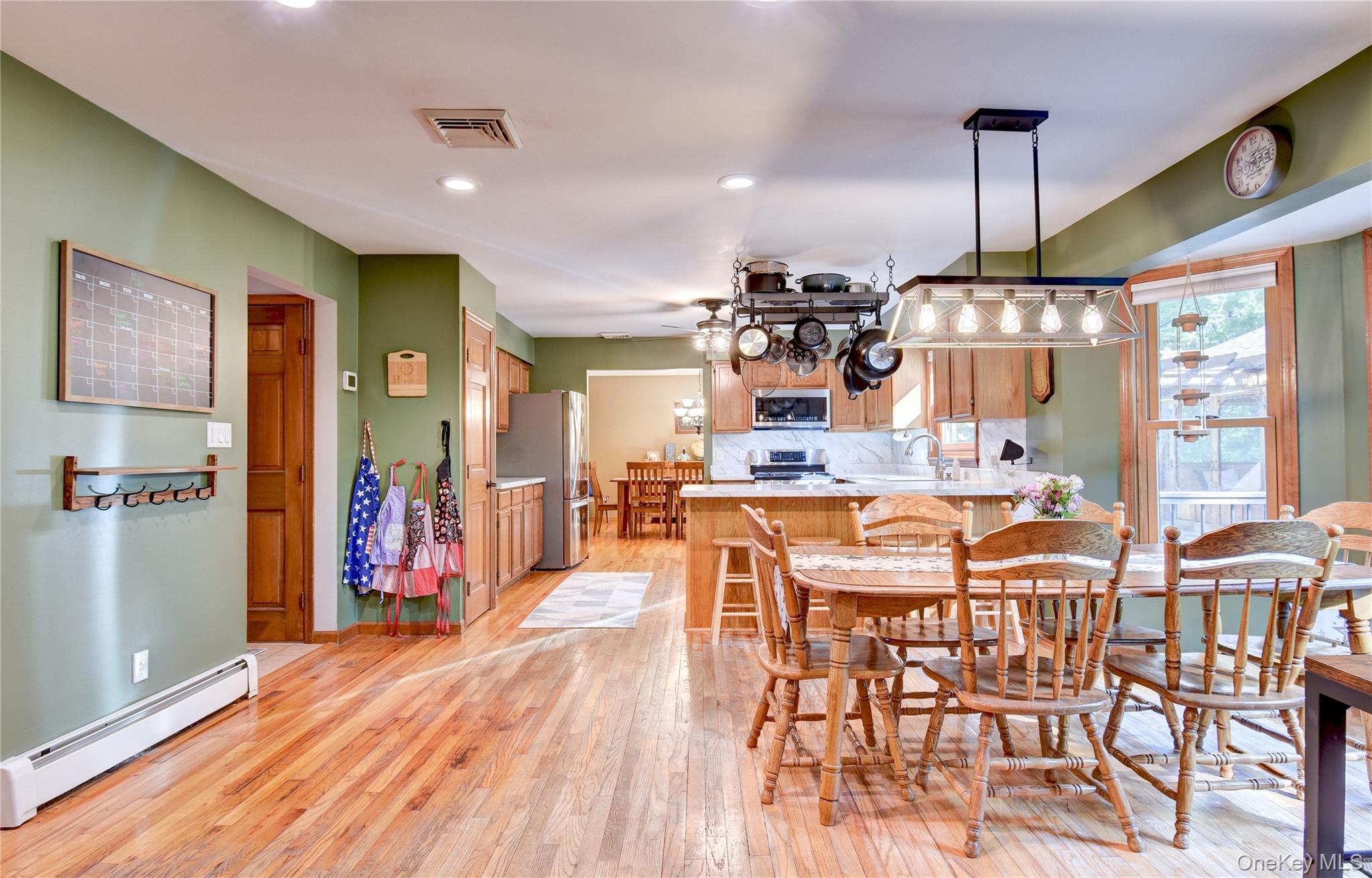 29 Valley View Road Bloomingburg, NY 12721 - Photo 8 of 50 a large kitchen with a table and chairs