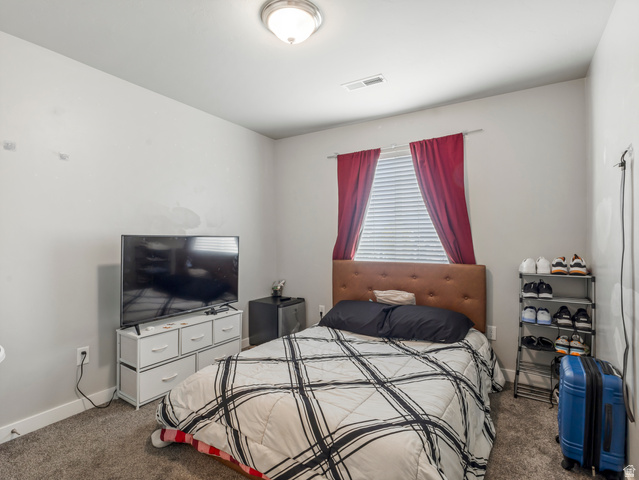 12214 Sunpark Lane Draper, UT 84020 - Photo 14 of 24 Bedroom featuring dark colored carpet