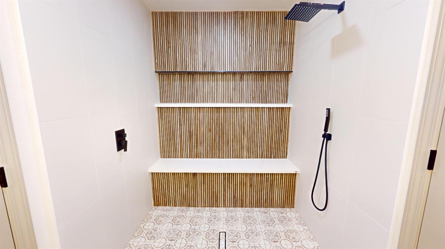 16363 Paula Road Madera, CA 93636 - Photo 14 of 29 a bathroom with a shower