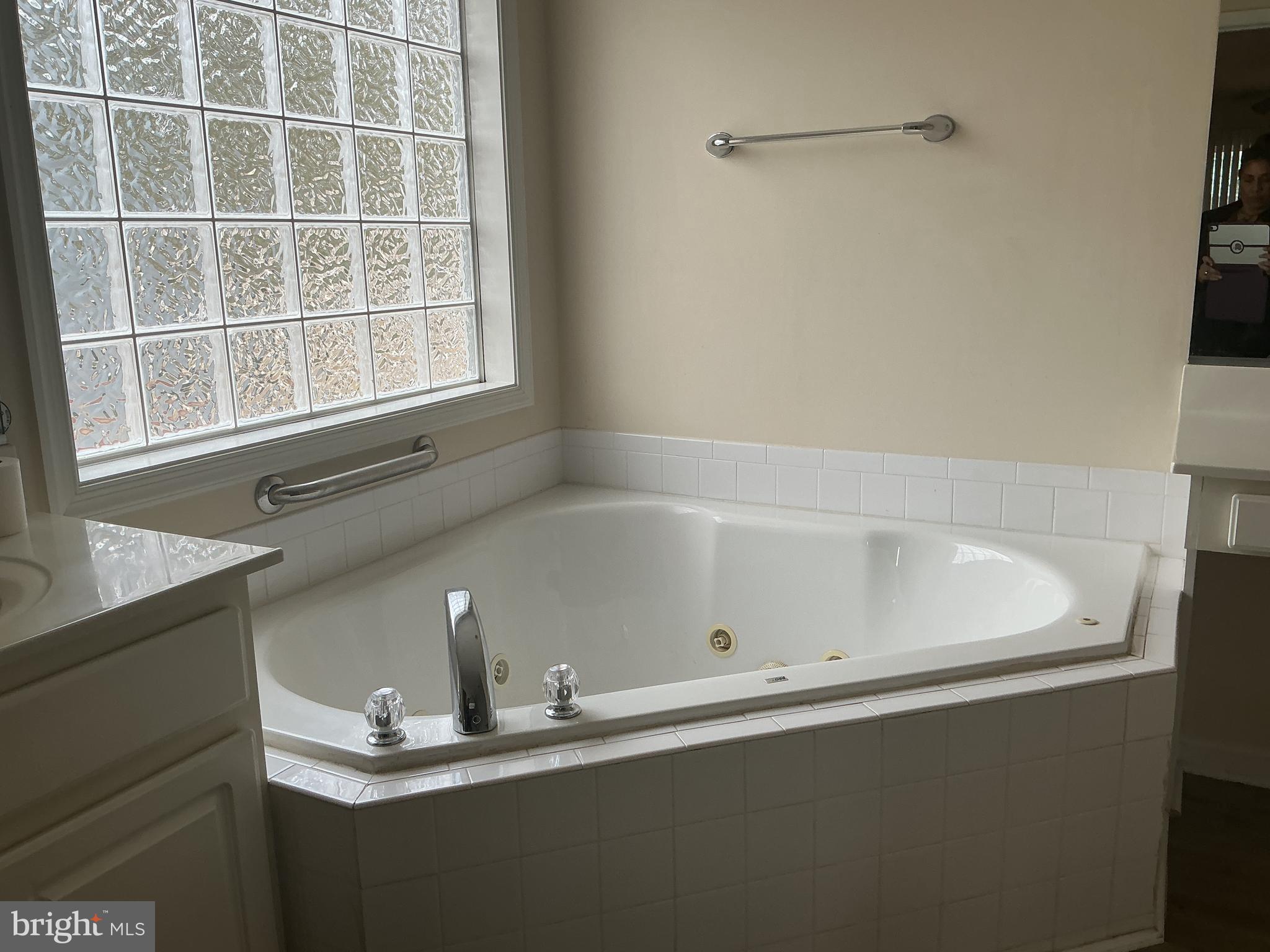 205 Freedom Road Locust Grove, VA 22508 - Photo 22 of 29 a bath tub sitting next to a window