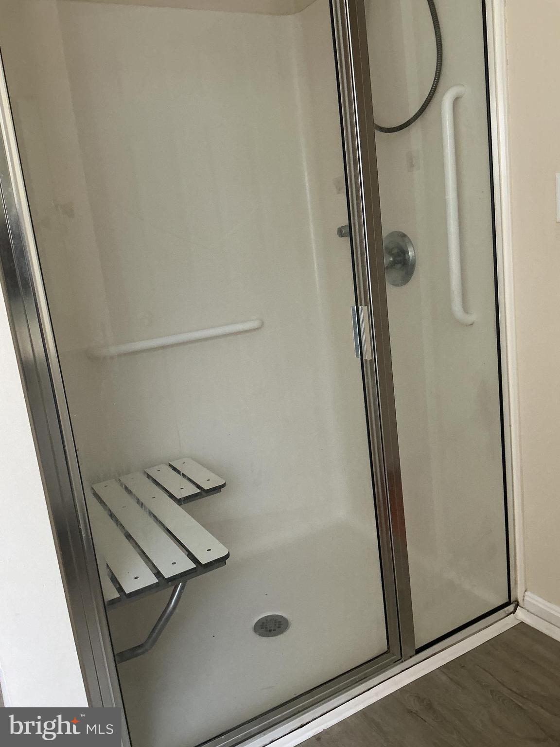 205 Freedom Road Locust Grove, VA 22508 - Photo 24 of 29 a bathroom with a glass shower door