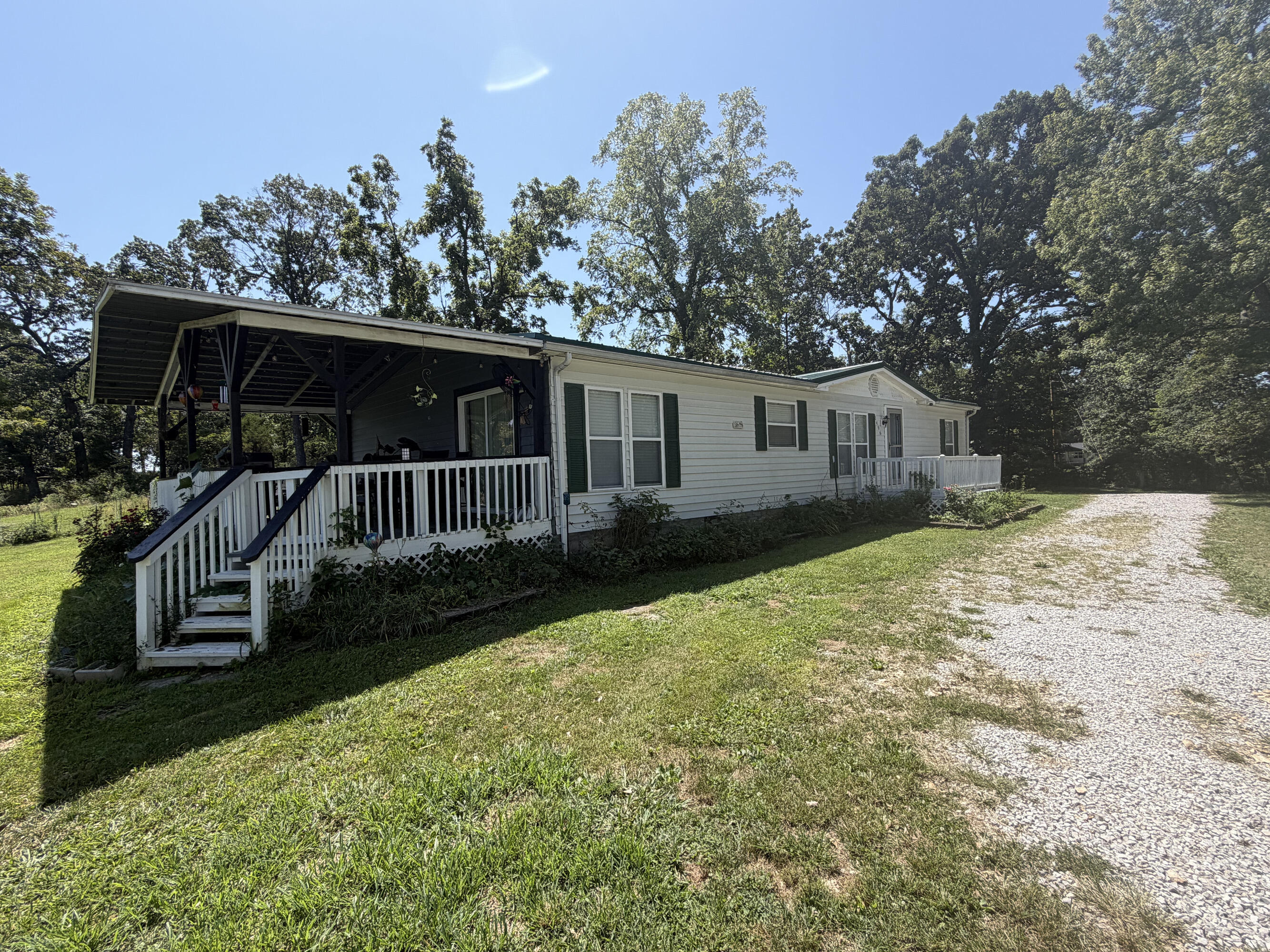 2496 Mills Road Ozark, MO 65721 - Photo 3 of 27 03_covered_porch
