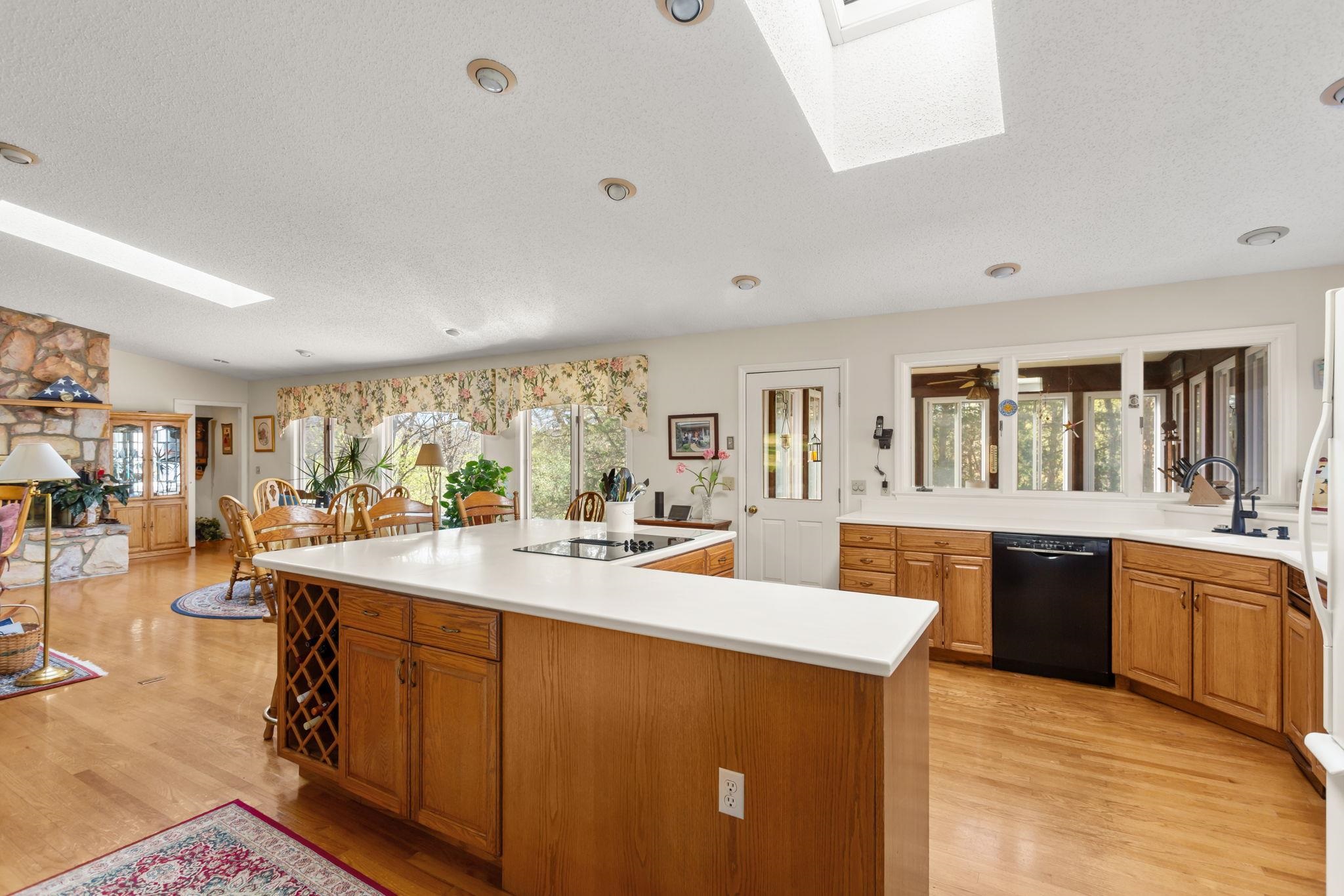 13004 Indian Trail Road Broadway, VA 22815 - Photo 14 of 56 a large kitchen with kitchen island a sink stainless steel appliances and cabinets